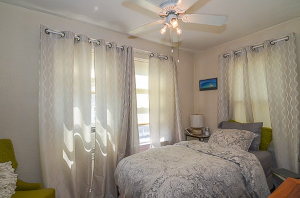 16 Kimball Road Watertown, MA 02472 - Photo 11 of 22 a bedroom with a bed and a window