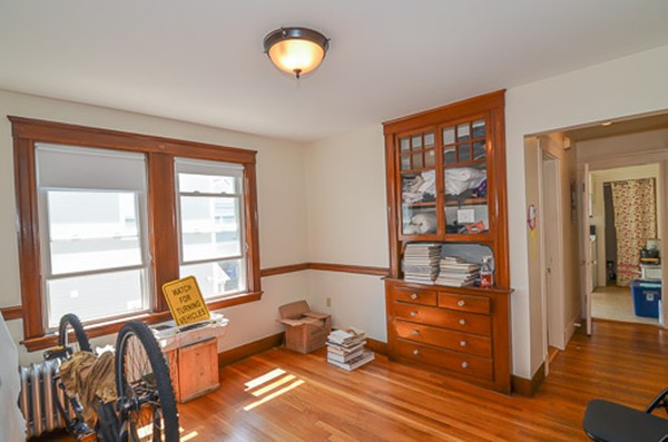 16 Kimball Road Watertown, MA 02472 - Photo 13 of 22 a bedroom with furniture and a window