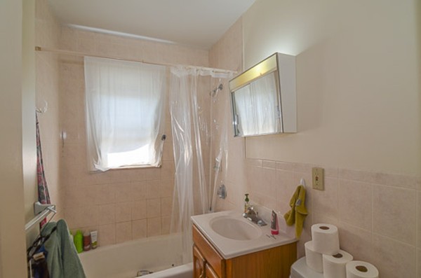 16 Kimball Road Watertown, MA 02472 - Photo 14 of 22 a bathroom with a sink toilet and shower