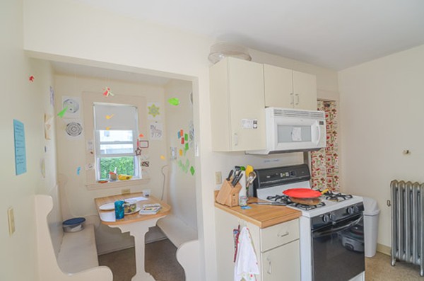 16 Kimball Road Watertown, MA 02472 - Photo 15 of 22 a room with furniture a washer and dryer