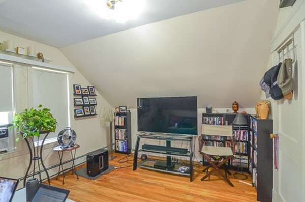 16 Kimball Road Watertown, MA 02472 - Photo 16 of 22 a living room with furniture and a flat screen tv