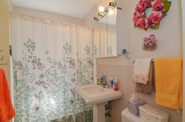 16 Kimball Road Watertown, MA 02472 - Photo 6 of 22 a bathroom with a sink toilet and shower