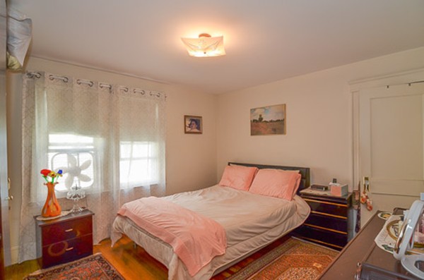 16 Kimball Road Watertown, MA 02472 - Photo 10 of 22 a bedroom with a bed and a window