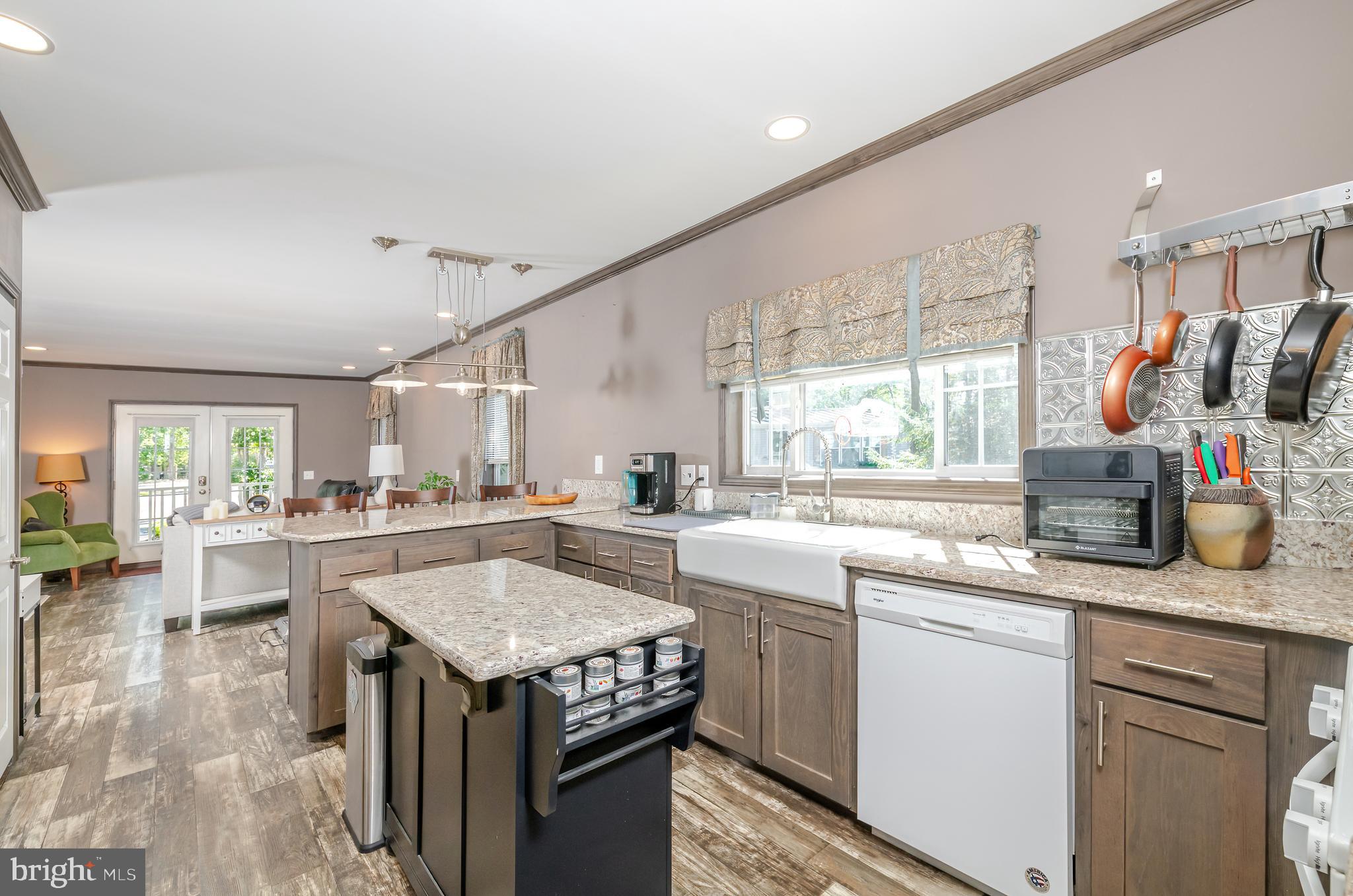 106 East Moss Mill Road, Unit T38 Galloway Township, NJ 08205 - Photo 12 of 28 a kitchen with a sink stove and cabinets