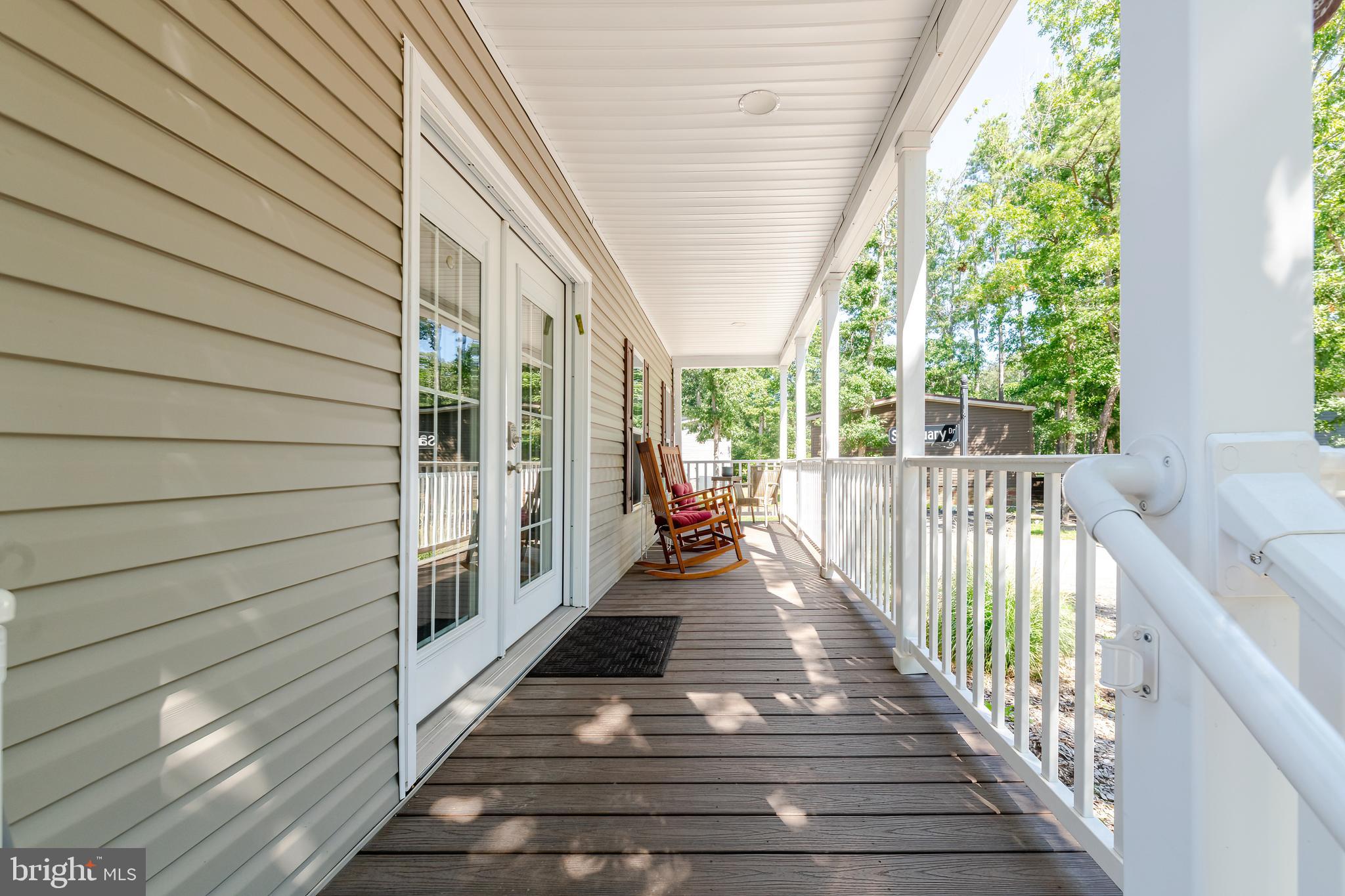 106 East Moss Mill Road, Unit T38 Galloway Township, NJ 08205 - Photo 4 of 28 a view of a porch with wooden floor and stairs