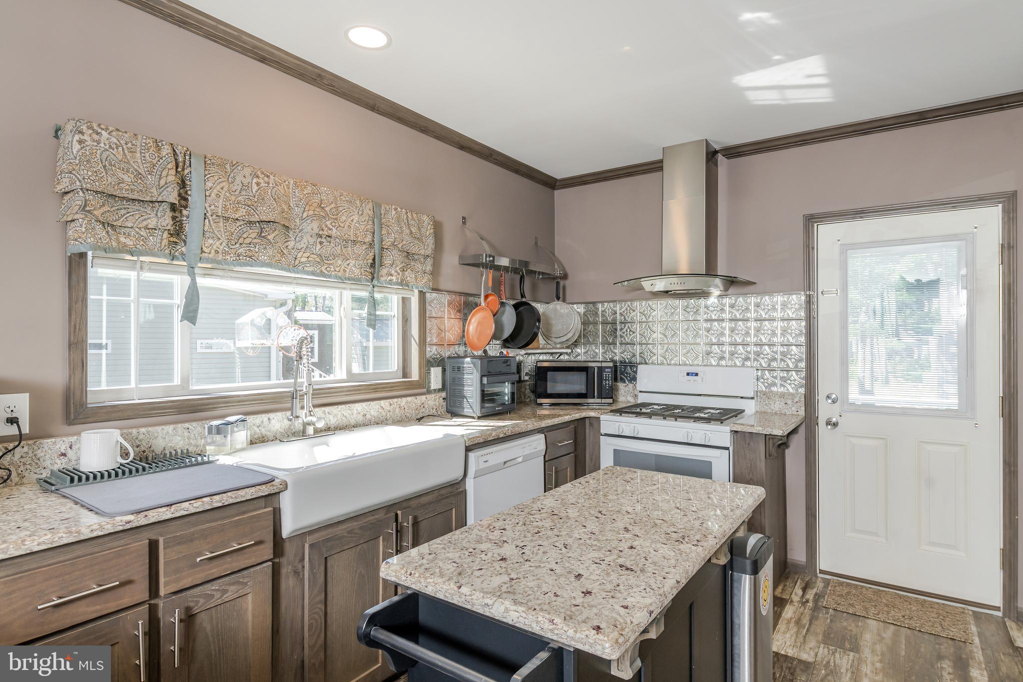106 East Moss Mill Road, Unit T38 Galloway Township, NJ 08205 - Photo 10 of 28 a kitchen with a sink stove and refrigerator