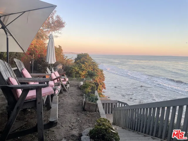a view of a terrace with furniture