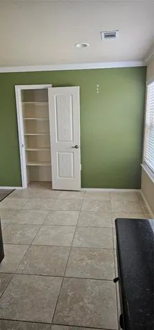 a view of room with walk in closet