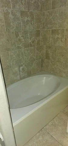 a bathroom with a bathtub