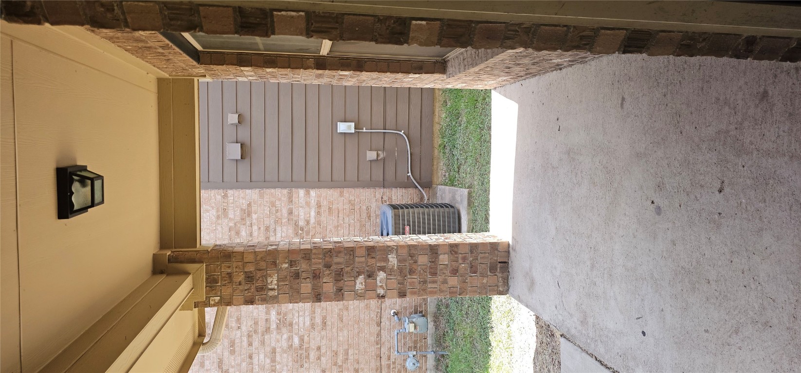 7213 Outfitter Drive Austin, TX 78744 - Photo 16 of 16 a view of a door of a house with a yard