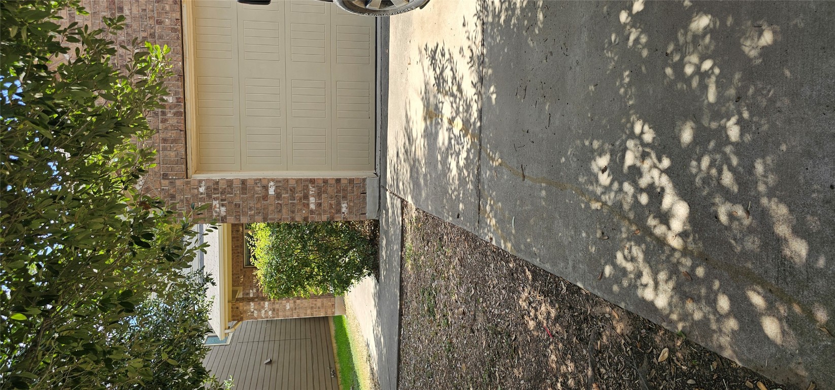 7213 Outfitter Drive Austin, TX 78744 - Photo 2 of 16 a view of a backyard of the house