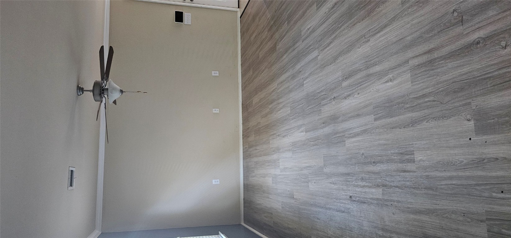 7213 Outfitter Drive Austin, TX 78744 - Photo 4 of 16 a view of a room with wooden floor