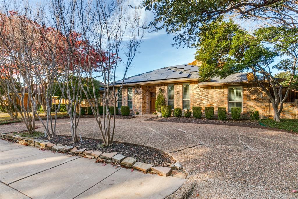 15881 Nedra Way Dallas, TX 75248 - Photo 1 of 26 a view of a house with street that has a tree