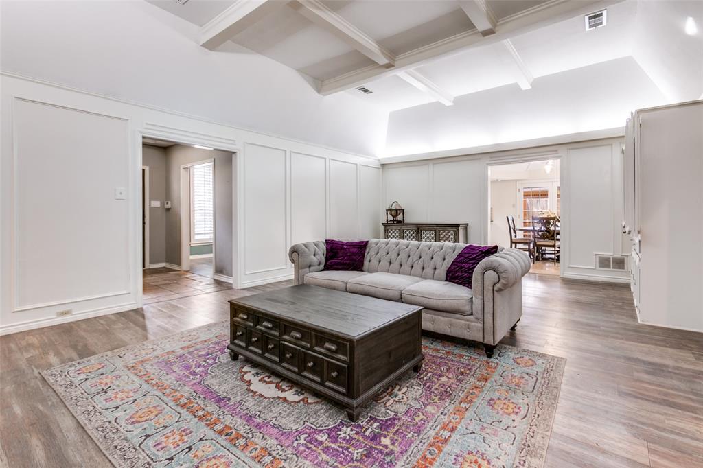 15881 Nedra Way Dallas, TX 75248 - Photo 10 of 26 a living room with furniture and wooden floor