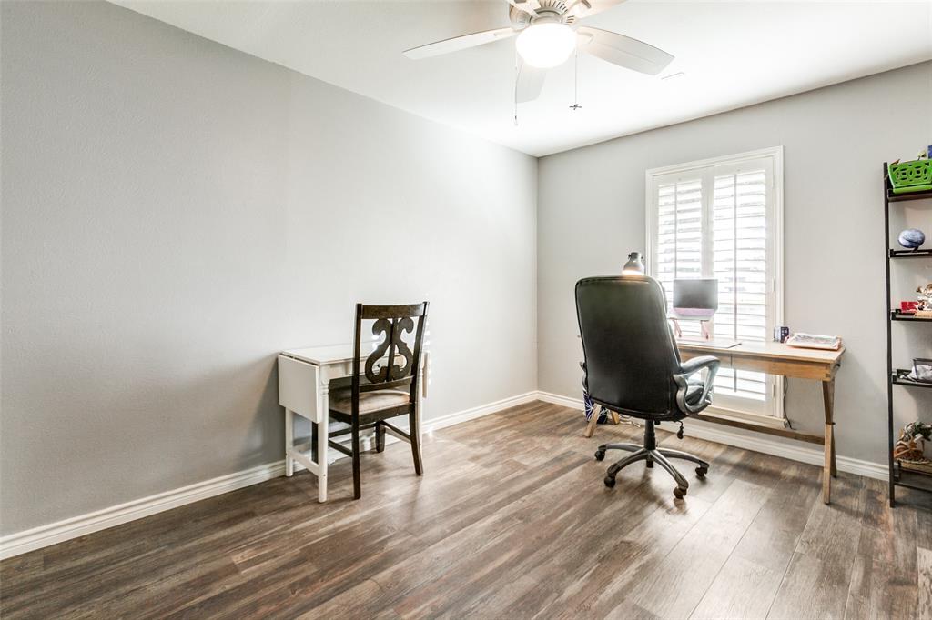 15881 Nedra Way Dallas, TX 75248 - Photo 20 of 26 a view of a workspace with furniture and a window