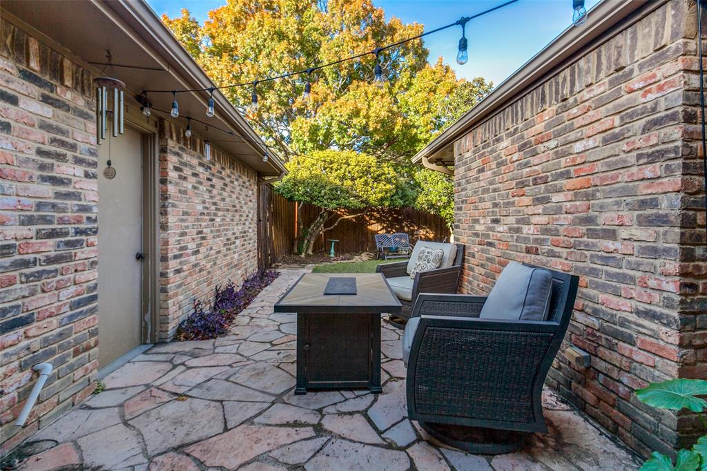 15881 Nedra Way Dallas, TX 75248 - Photo 23 of 26 a view of backyard with outdoor seating