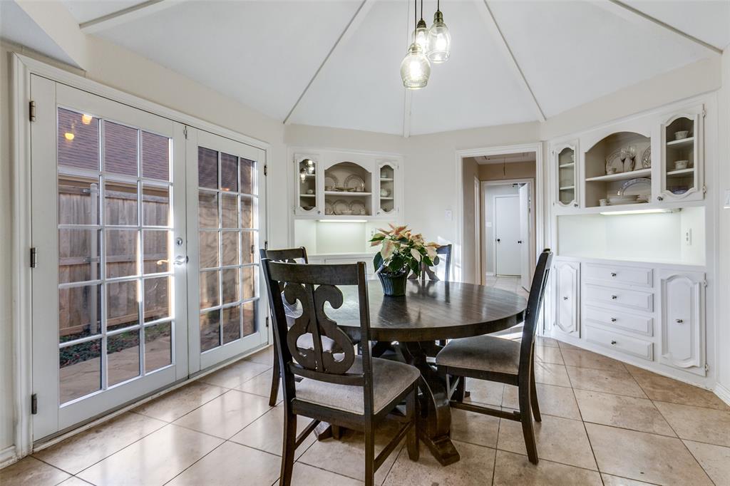 15881 Nedra Way Dallas, TX 75248 - Photo 7 of 26 a view of a dining room with furniture and chandelier
