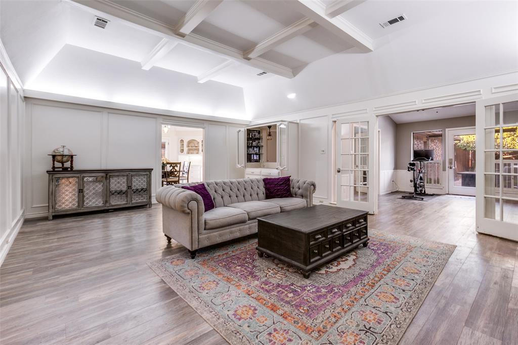 15881 Nedra Way Dallas, TX 75248 - Photo 26 of 26 a living room with furniture and wooden floor