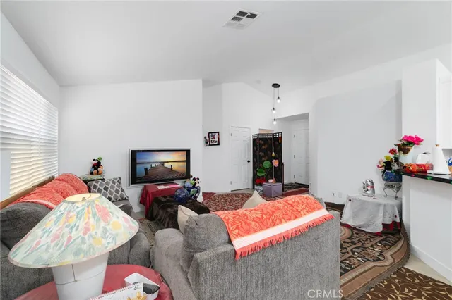 a bedroom with a bed and furniture