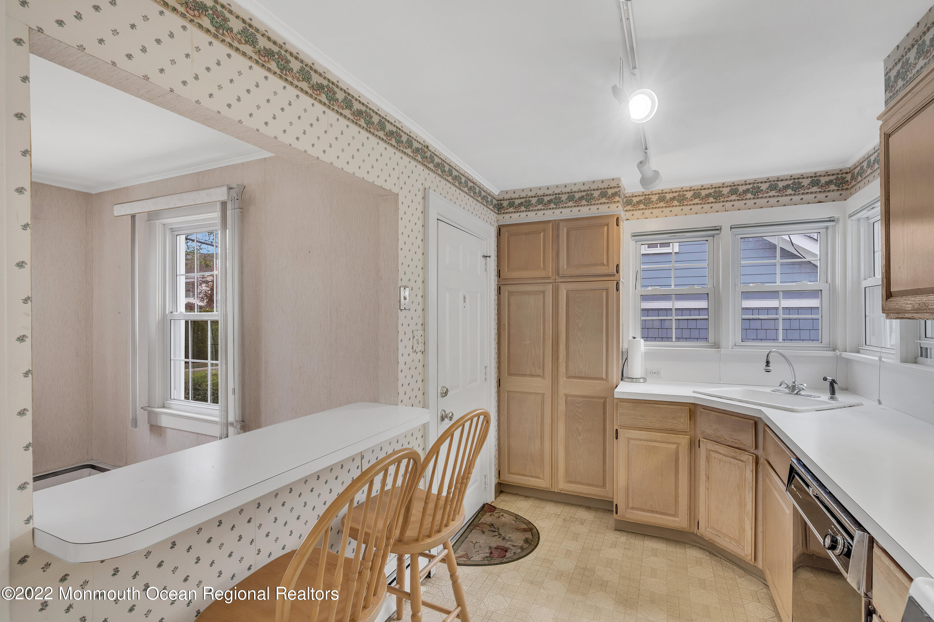 1107 5th Avenue Spring Lake, NJ 07762 - Photo 20 of 30 a spacious bathroom with a tub sink and mirror