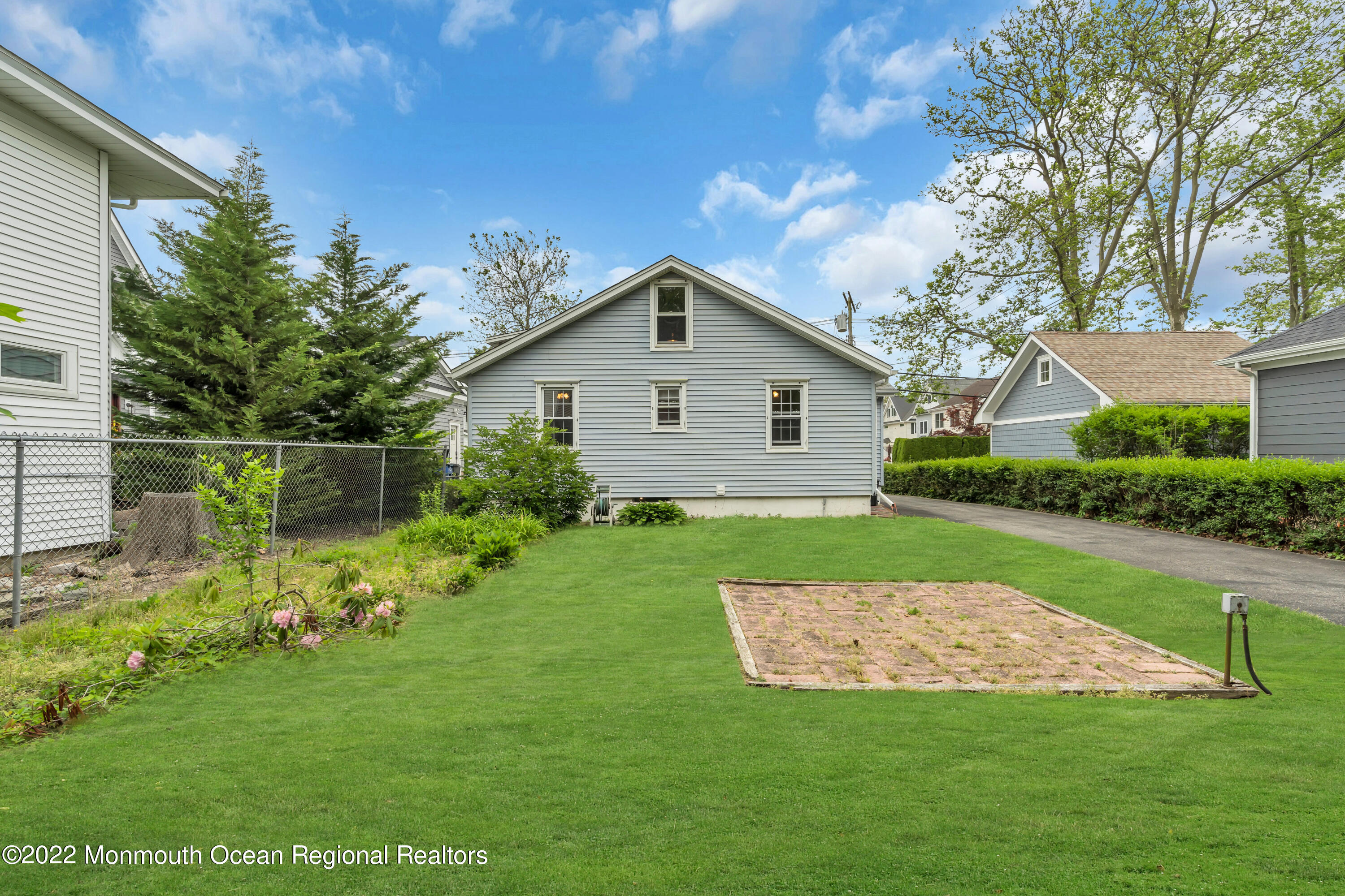 1107 5th Avenue Spring Lake, NJ 07762 - Photo 8 of 30 a view of a house with a yard