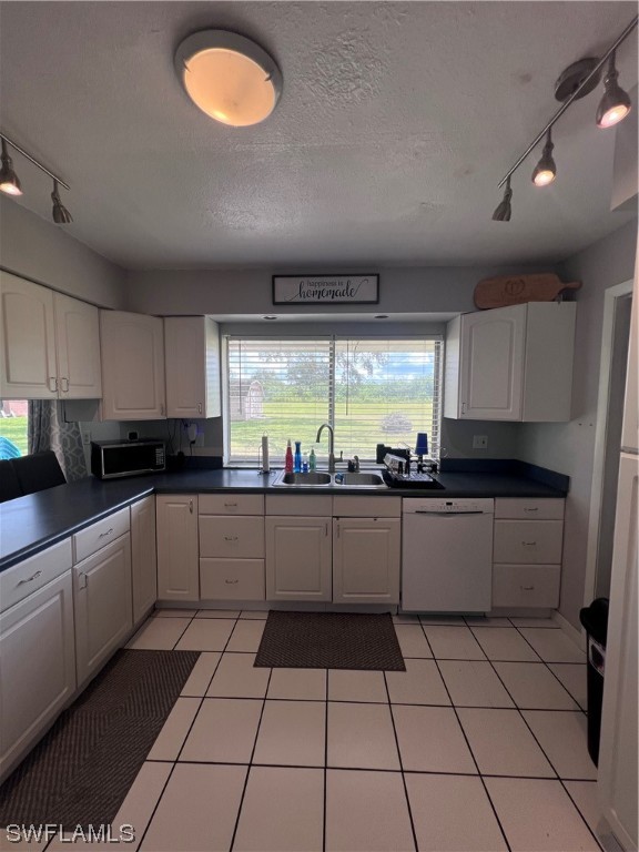4020 Rainbow Circle LaBelle, FL 33935 - Photo 21 of 30 a kitchen with a sink and cabinets