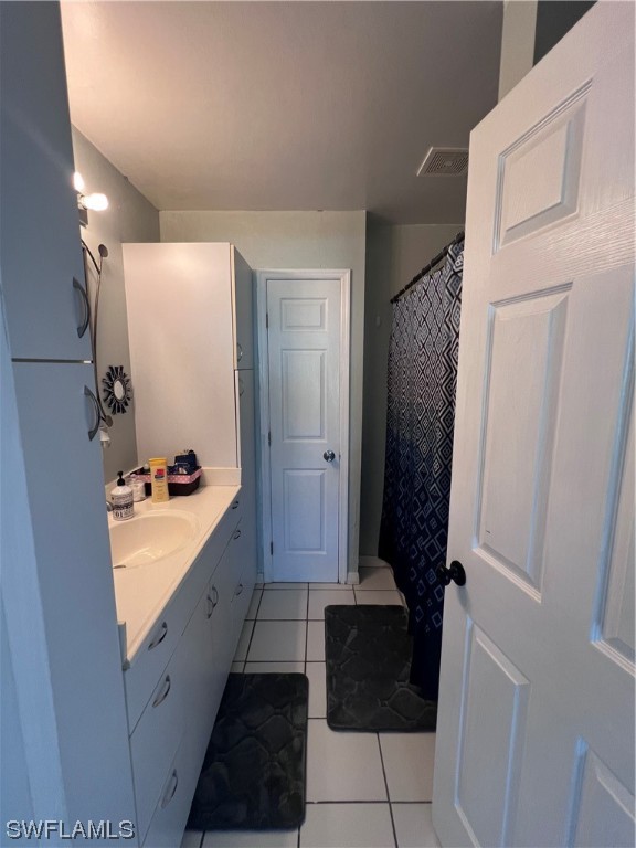 4020 Rainbow Circle LaBelle, FL 33935 - Photo 28 of 30 a bathroom with a sink and a mirror