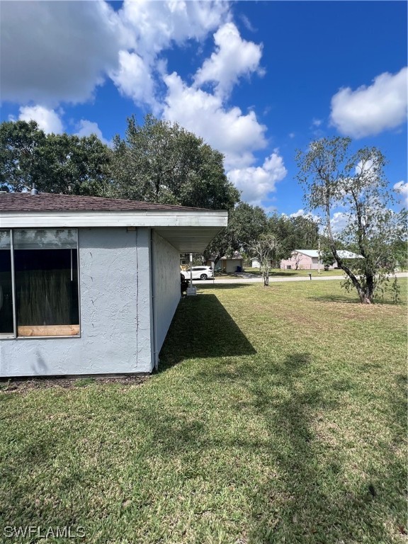 4020 Rainbow Circle LaBelle, FL 33935 - Photo 9 of 30 a view of outdoor space yard and swimming pool