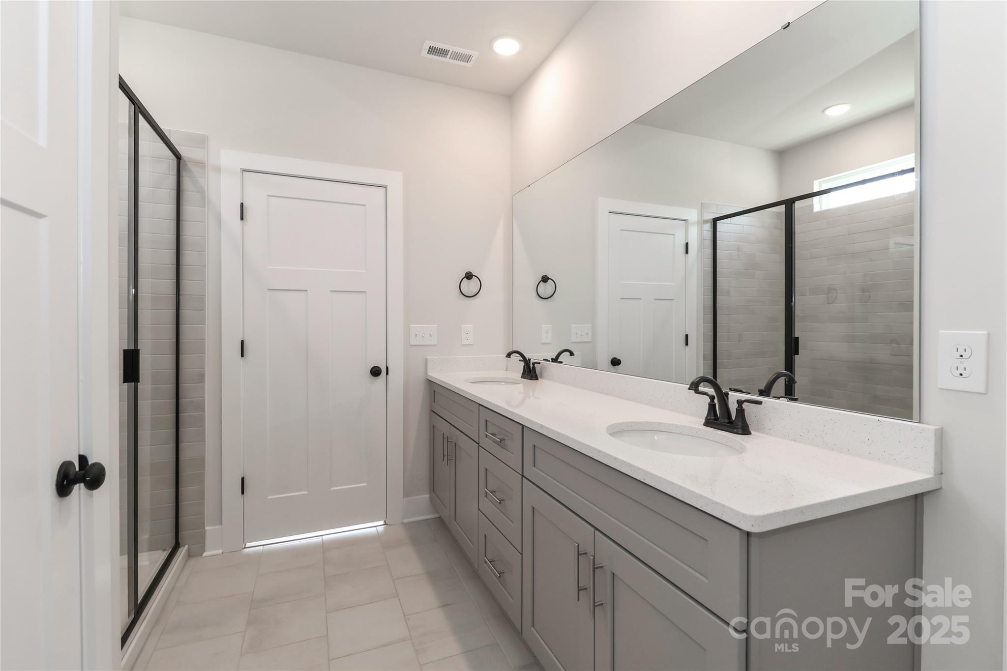 269 Monticello Road Statesville, NC 28625 - Photo 19 of 31 a bathroom with a sink and a mirror