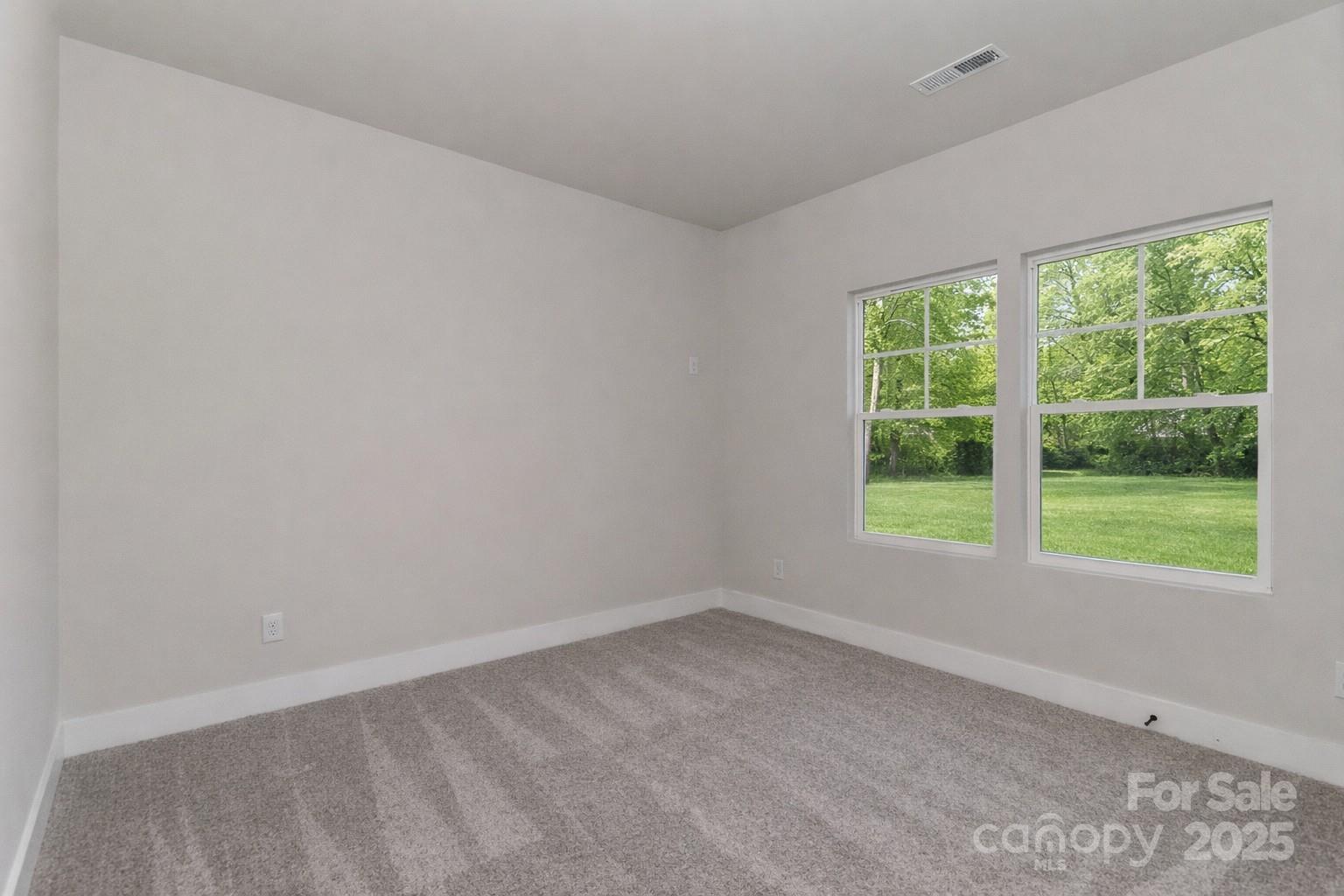 269 Monticello Road Statesville, NC 28625 - Photo 24 of 31 an empty room with a window