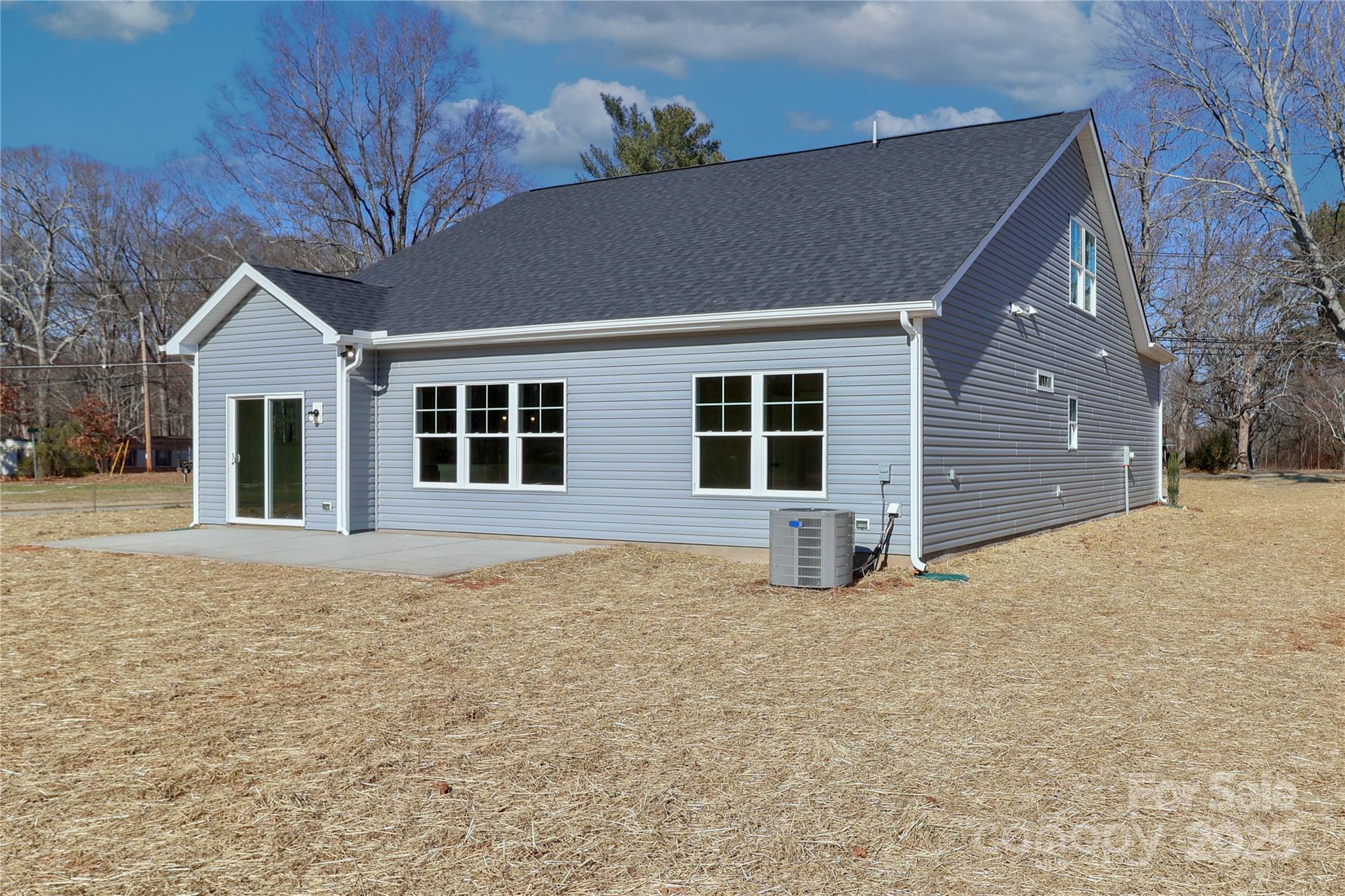 269 Monticello Road Statesville, NC 28625 - Photo 30 of 31 a view of a house with a yard and garage