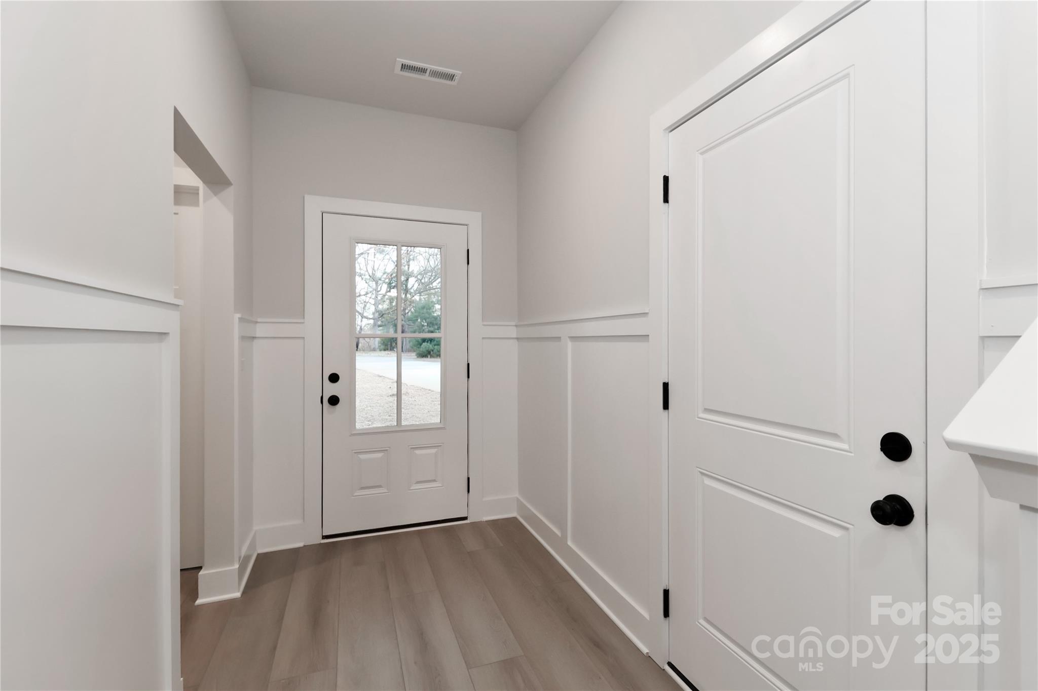 269 Monticello Road Statesville, NC 28625 - Photo 4 of 31 a view of a bathroom with wooden floor