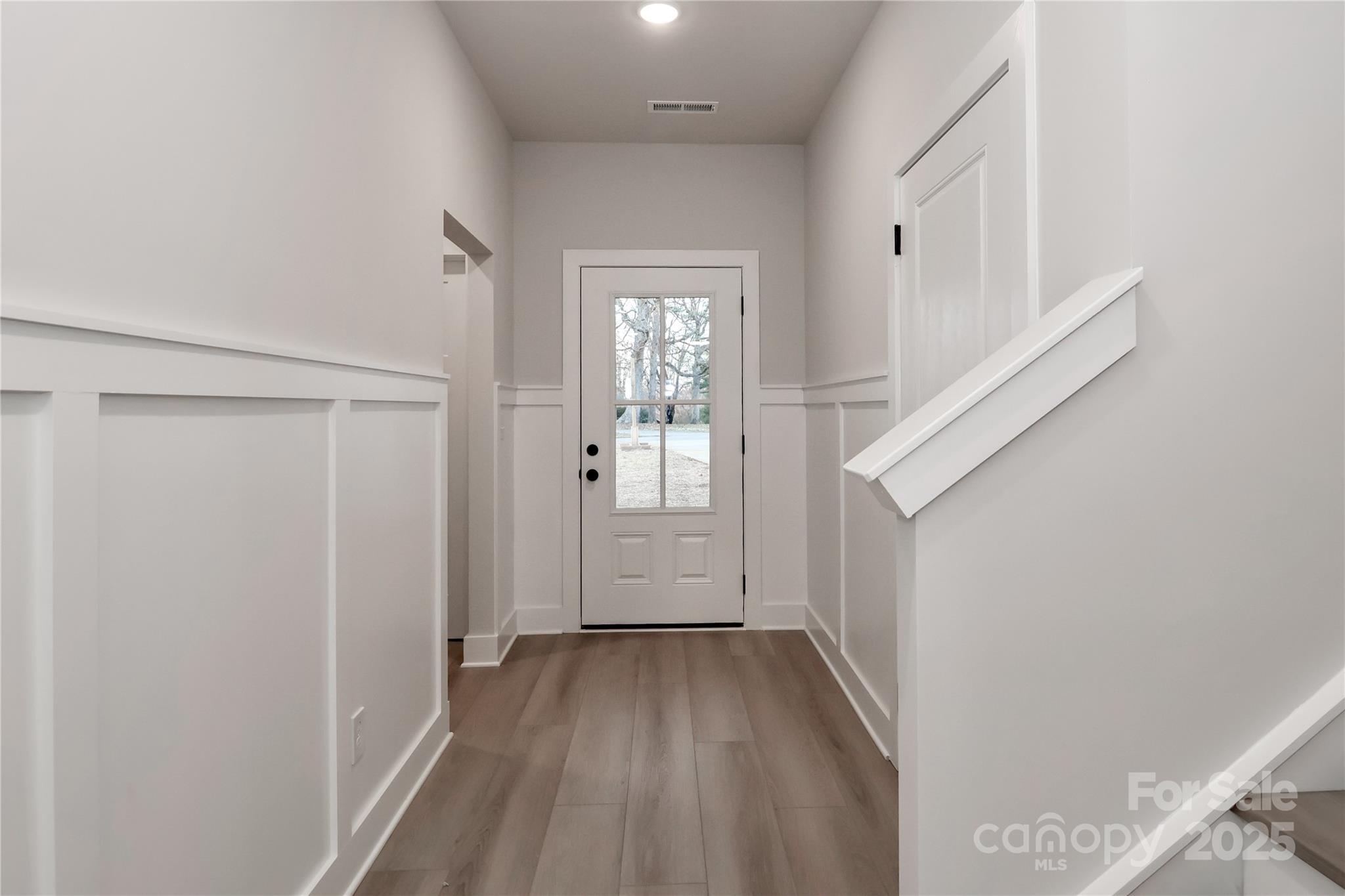 269 Monticello Road Statesville, NC 28625 - Photo 5 of 31 a view of a hallway with wooden floor and entryway