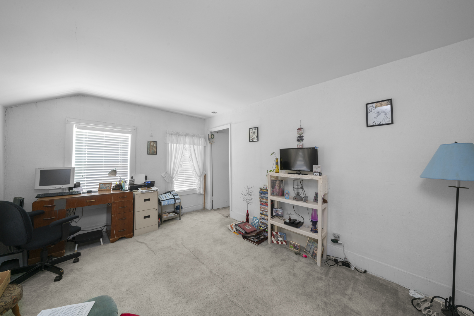 316 Chicago Road Paw Paw, IL 61353 - Photo 18 of 22 a room with furniture and a flat screen tv