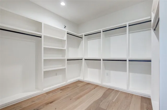 a view of an empty walk in closet