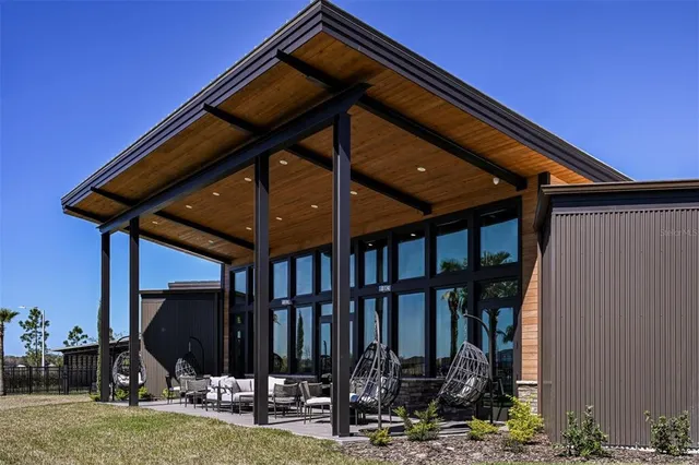 a view of a swimming pool with a patio