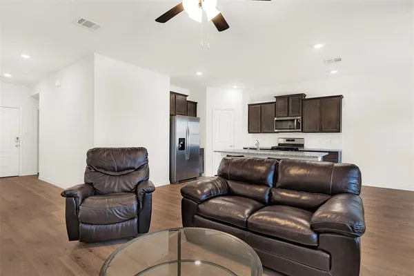 a living room with furniture or couch and a flat screen tv