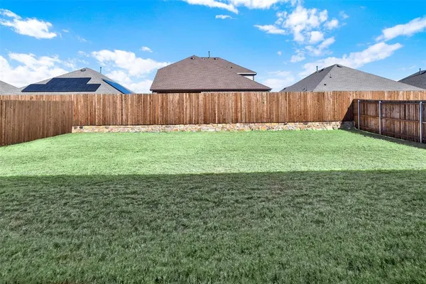 a view of a backyard with a garden