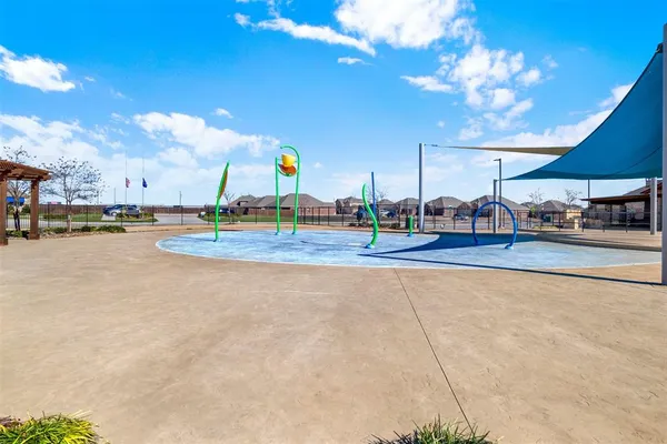 a view of backyard with basket ball court