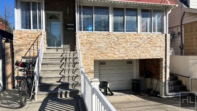 a view of building with wooden floor and seating space