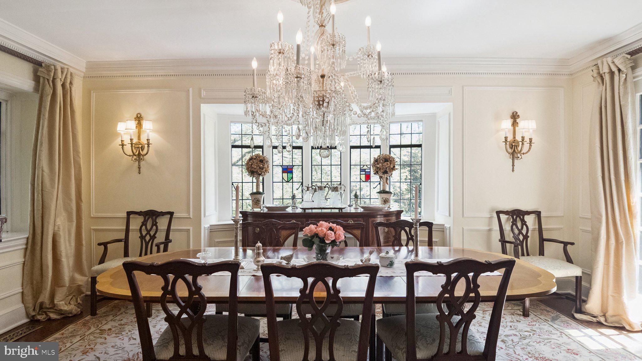 517 Fishers Road Bryn Mawr, PA 19010 - Photo 12 of 70 a view of a dining room with furniture and chandelier