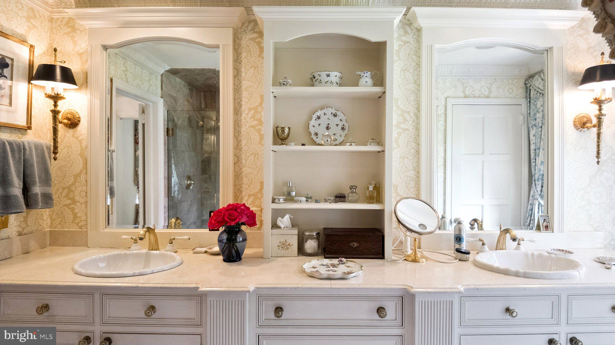 517 Fishers Road Bryn Mawr, PA 19010 - Photo 37 of 70 a bathroom with sink mirror and vanity