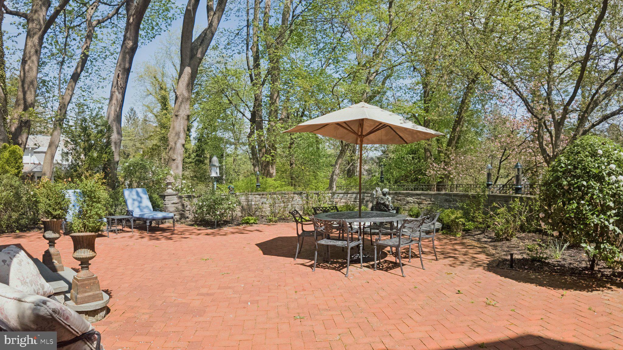 517 Fishers Road Bryn Mawr, PA 19010 - Photo 60 of 70 a view of backyard with outdoor seating and trees