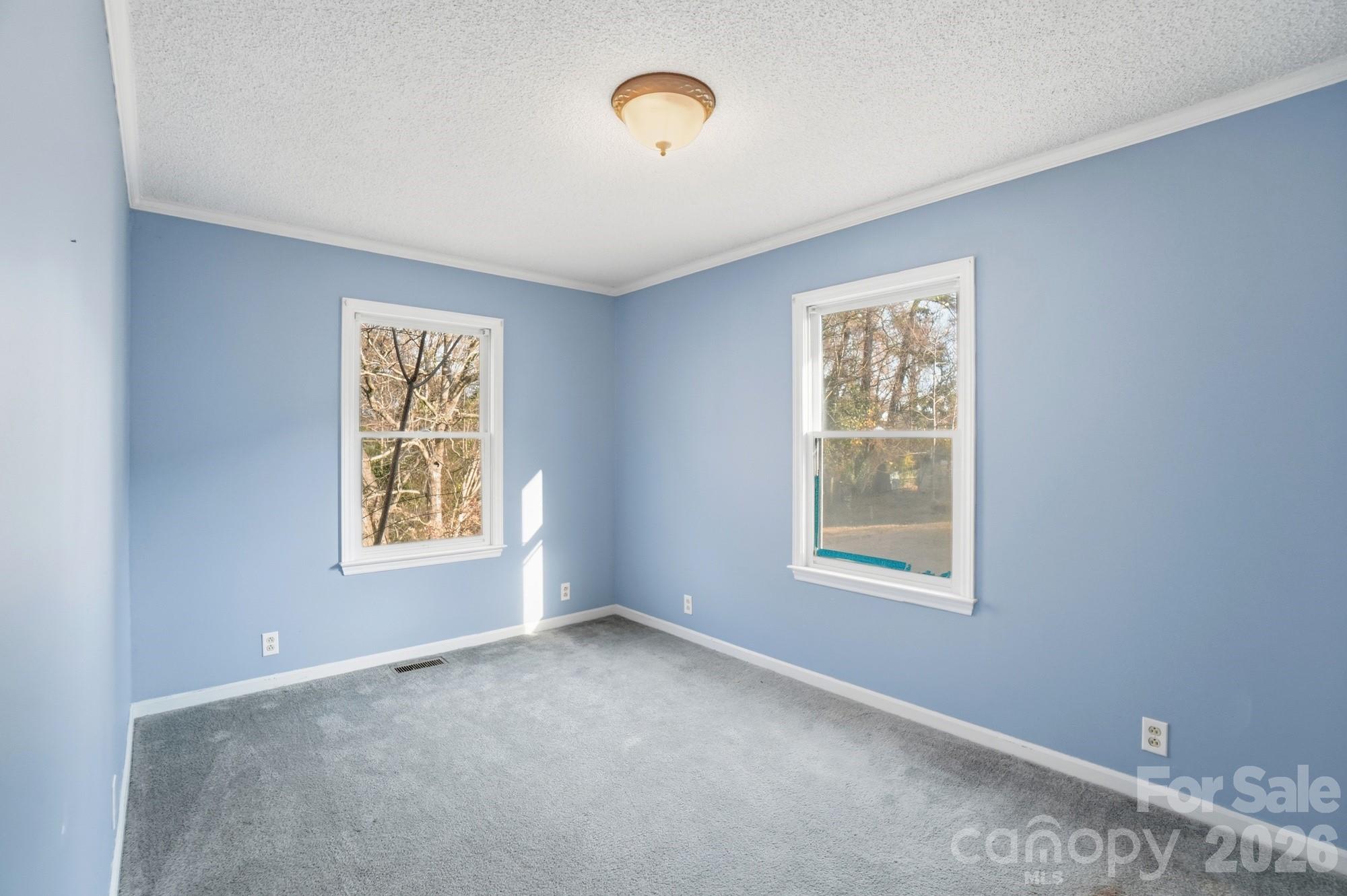 149 Swink Street Southwest Concord, NC 28027 - Photo 19 of 24 a view of an empty room with a window
