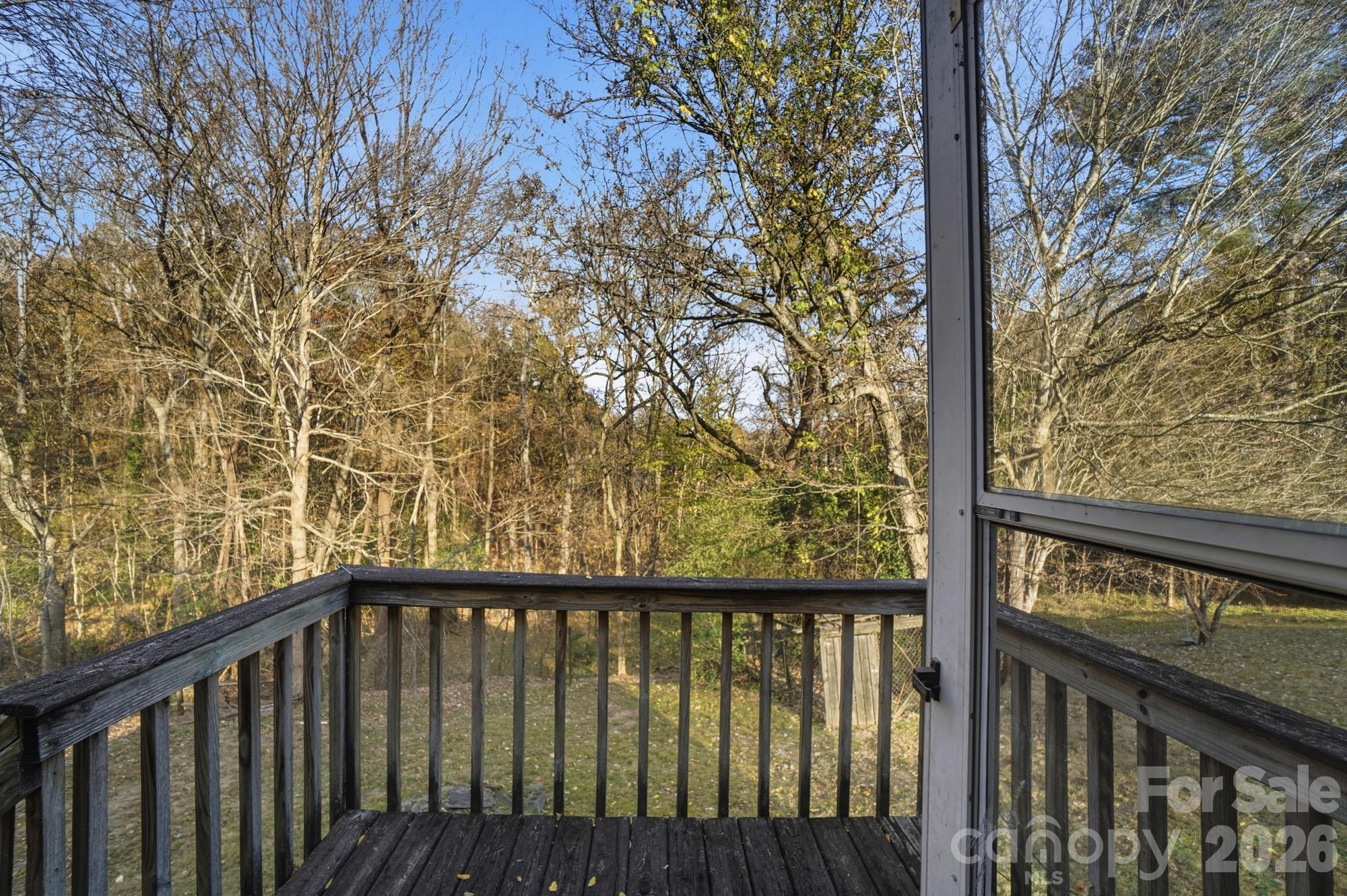 149 Swink Street Southwest Concord, NC 28027 - Photo 23 of 24 a view of a balcony with wooden fence and floor