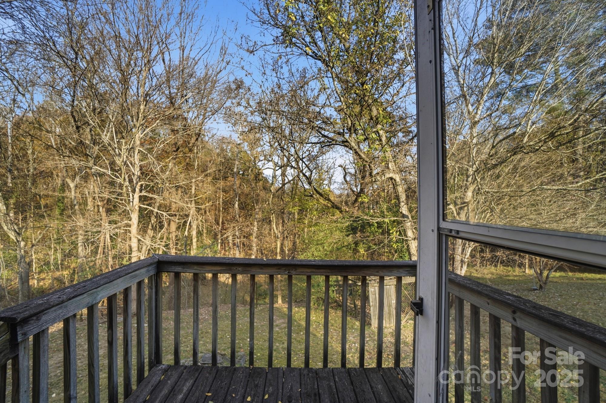 149 Swink Street Southwest Concord, NC 28027 - Photo 25 of 27 a view of a balcony with wooden fence and floor