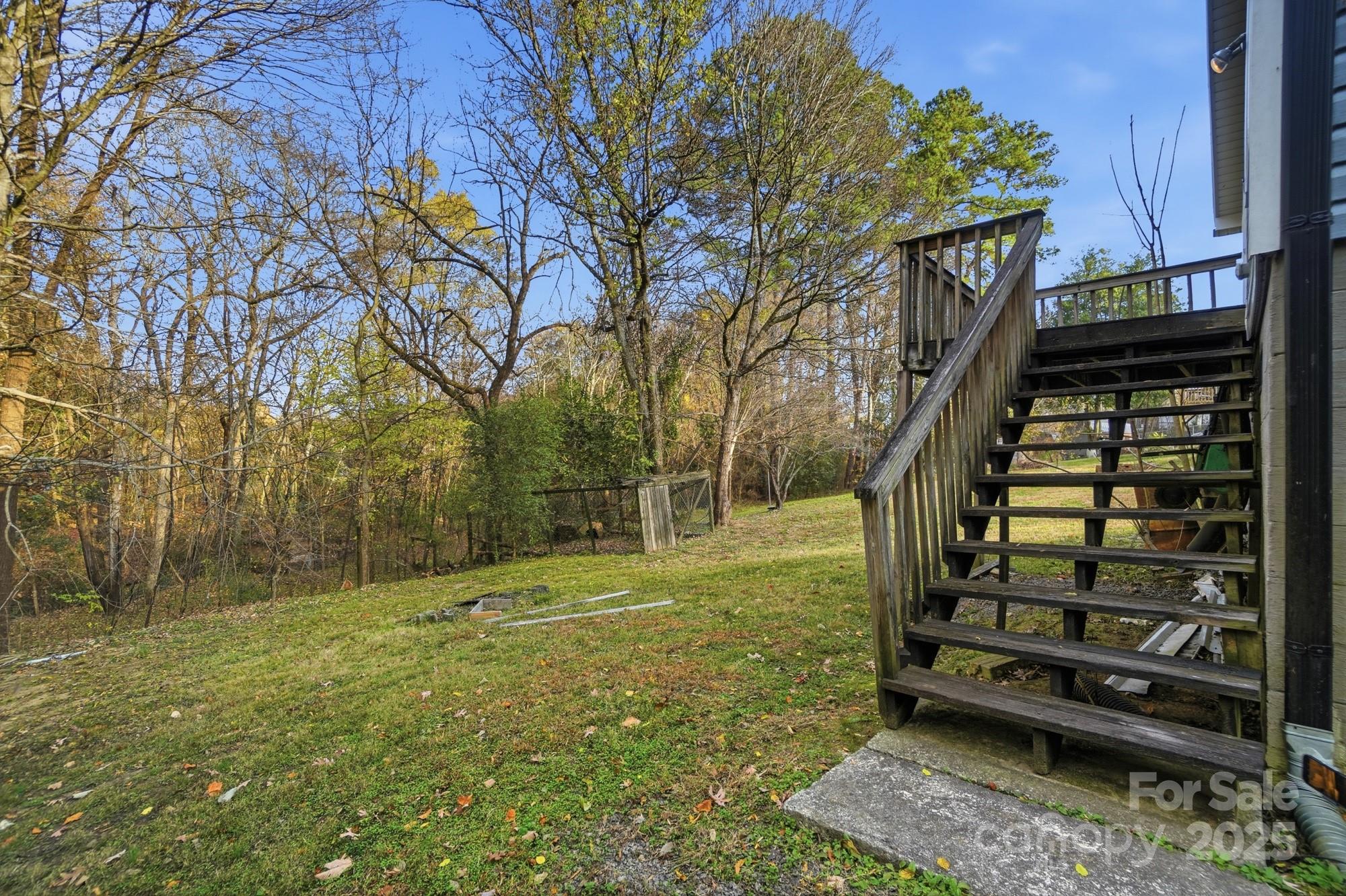 149 Swink Street Southwest Concord, NC 28027 - Photo 26 of 27 a view of a yard in front of house