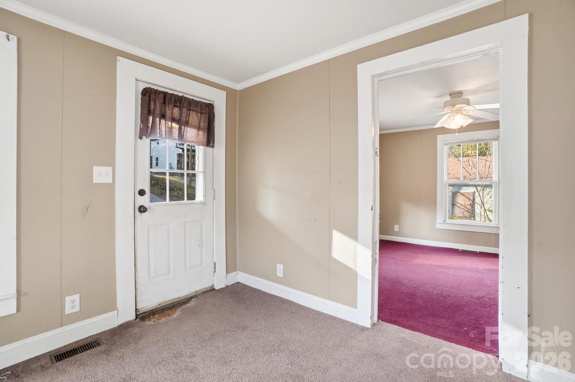 149 Swink Street Southwest Concord, NC 28027 - Photo 5 of 24 an empty room with windows and closet