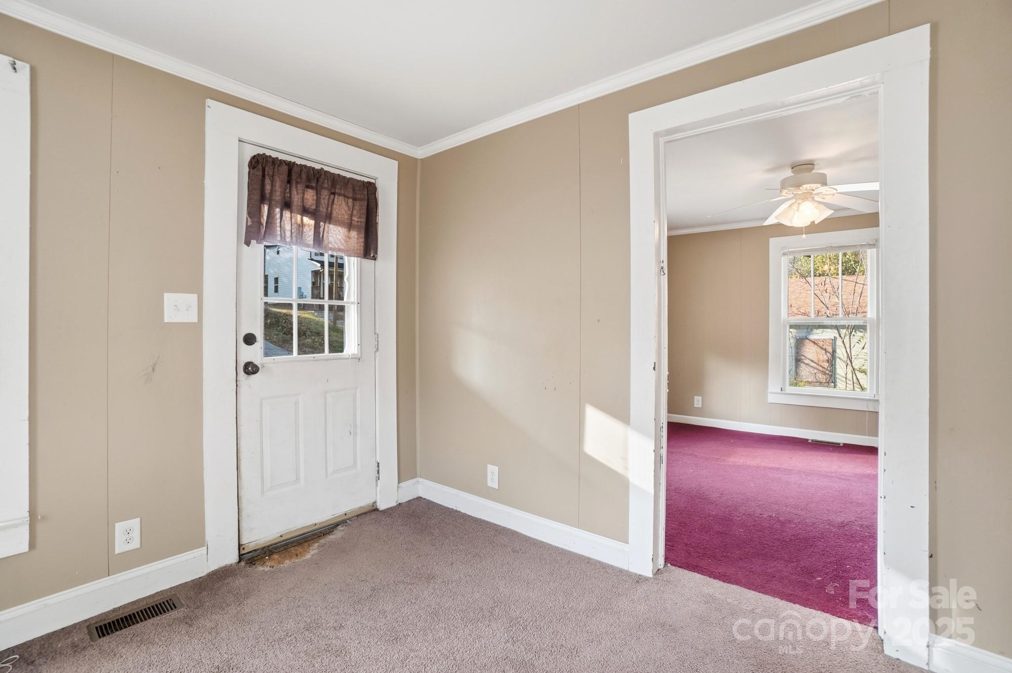 149 Swink Street Southwest Concord, NC 28027 - Photo 7 of 27 an empty room with windows and closet