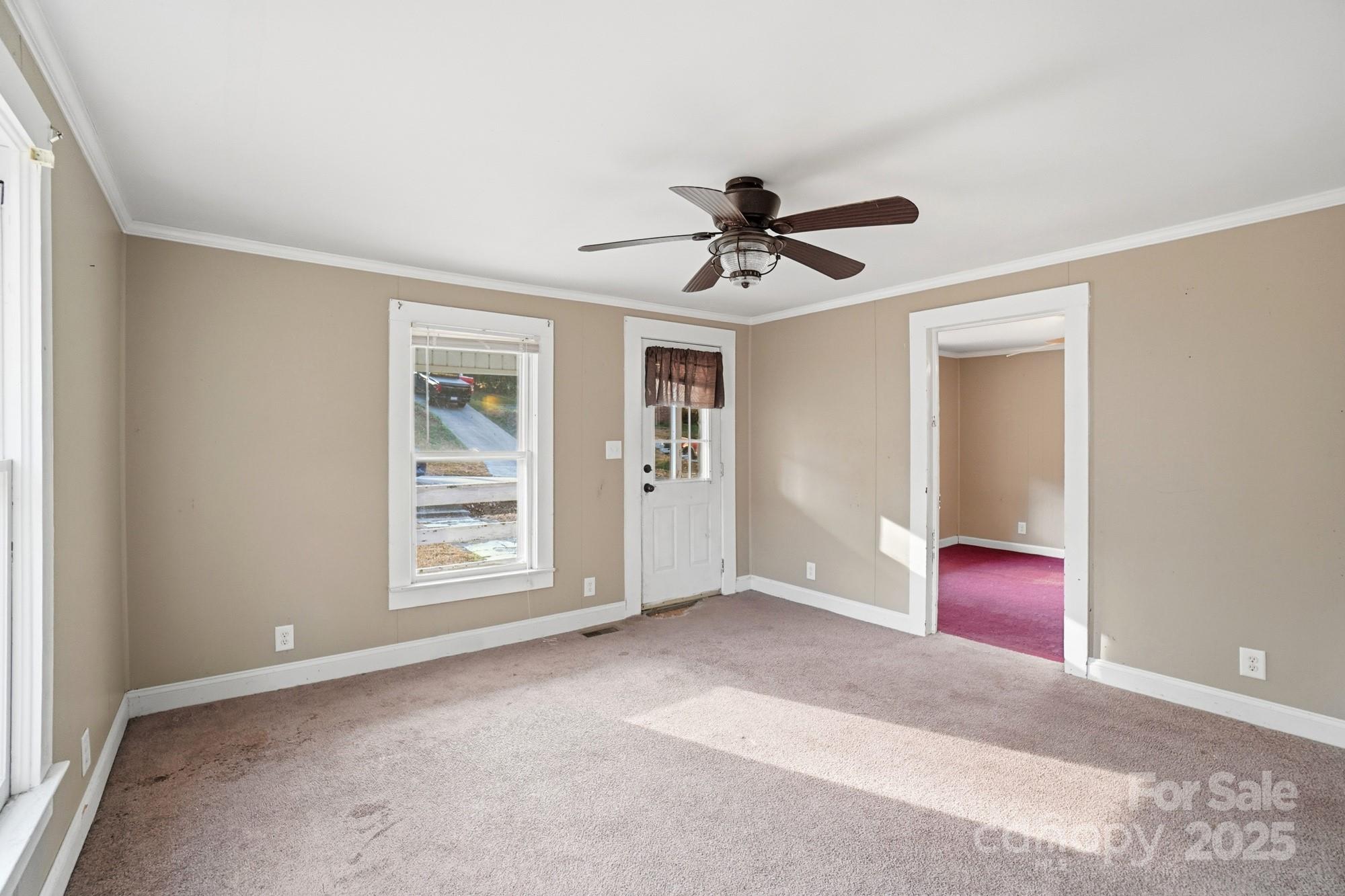 149 Swink Street Southwest Concord, NC 28027 - Photo 9 of 27 wooden floor in an empty room with a window